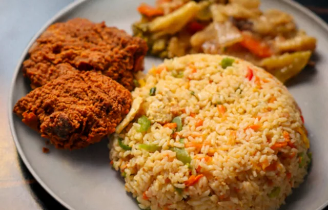Deshi Chinese platter: two pieces of crispy fried chicken, vegetable fried rice and mixed vegetables